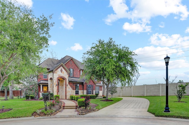 5402 Bending Branch Dr, Missouri City, TX 77459 - view of front of property with stone siding, brick siding, and concrete driveway