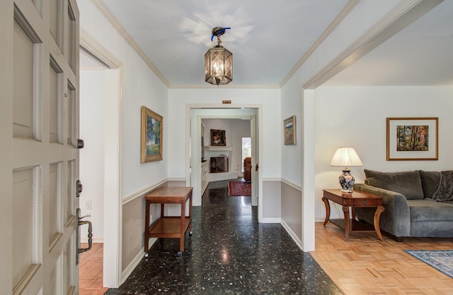 6119 Bankside Dr, Houston, TX 77096 - entrance foyer with baseboards, a chandelier, a fireplace, and ornamental molding