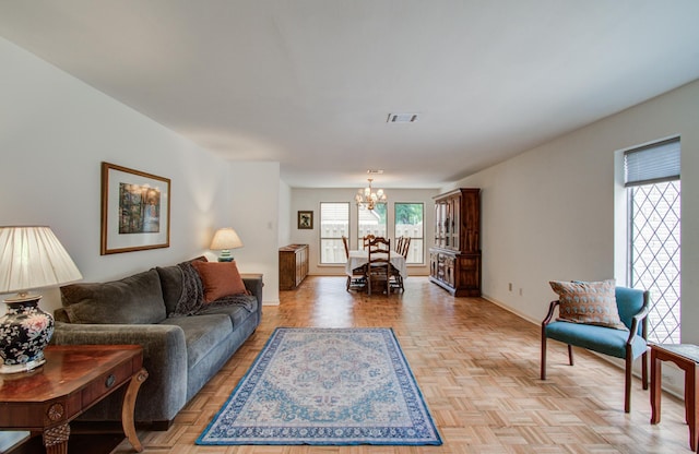 6119 Bankside Dr, Houston, TX 77096 - living room featuring a chandelier and baseboards