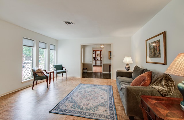 6119 Bankside Dr, Houston, TX 77096 - living area featuring a chandelier and baseboards