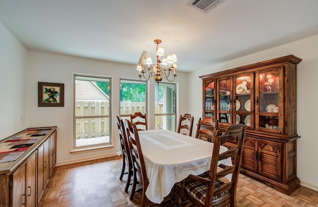 6119 Bankside Dr, Houston, TX 77096 - dining room with a chandelier and baseboards