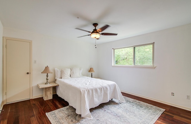 6119 Bankside Dr, Houston, TX 77096 - bedroom with wood finished floors, baseboards, and ceiling fan