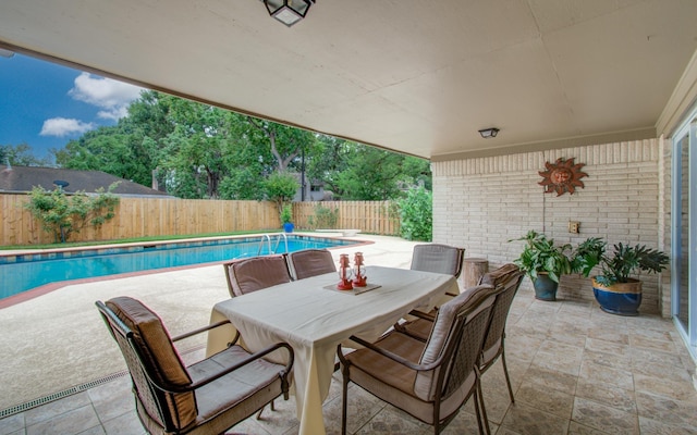 6119 Bankside Dr, Houston, TX 77096 - fenced backyard with a patio and outdoor dining space