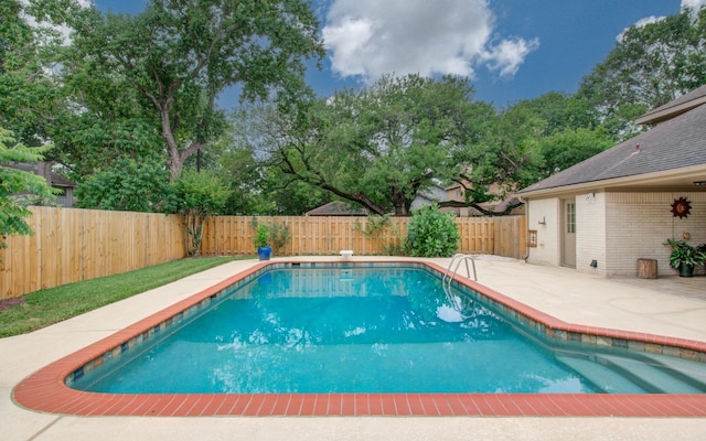 6119 Bankside Dr, Houston, TX 77096 - view of pool with a patio area and a fenced backyard