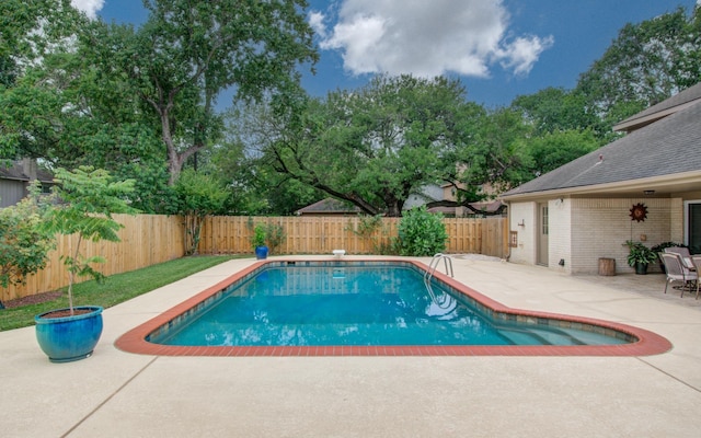 6119 Bankside Dr, Houston, TX 77096 - view of swimming pool with a patio and a fenced backyard