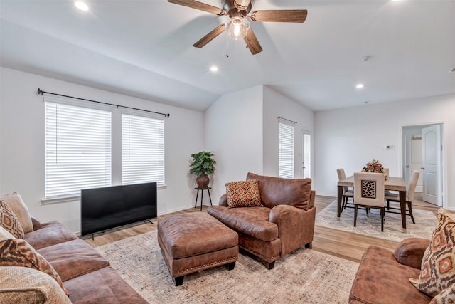 15007 Ashton Meadows Dr, New Caney, TX 77357 - living area with a ceiling fan, light wood-style floors, recessed lighting, baseboards, and vaulted ceiling