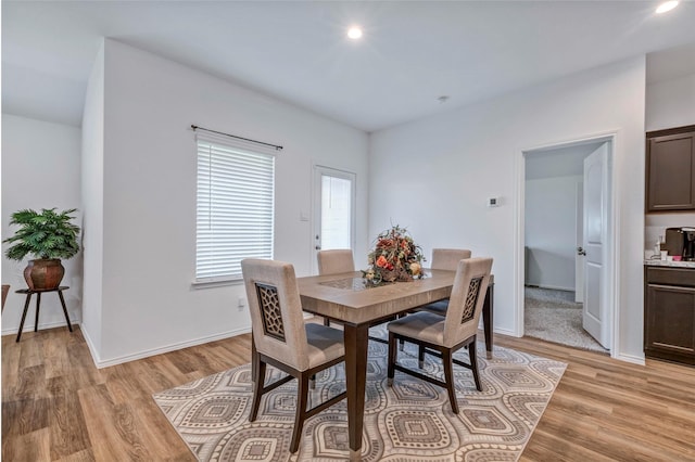 15007 Ashton Meadows Dr, New Caney, TX 77357 - dining space featuring light wood-style floors, baseboards, and recessed lighting