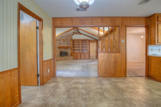 333 Hardy St, Huntsville, TX 77340 - hallway with wood walls and wallpapered walls