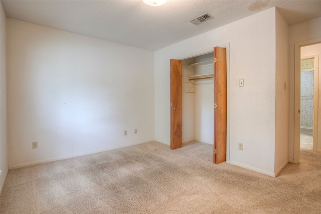 333 Hardy St, Huntsville, TX 77340 - unfurnished bedroom featuring carpet flooring and baseboards