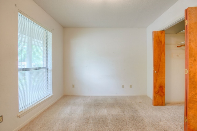 333 Hardy St, Huntsville, TX 77340 - carpeted empty room featuring baseboards
