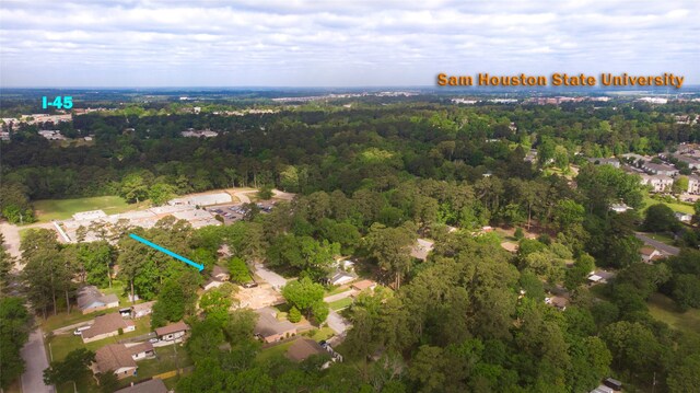333 Hardy St, Huntsville, TX 77340 - view of property location with a forest and nearby suburban area