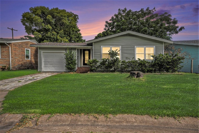 116 Whiting St, Galveston, TX 77550 - ranch-style home featuring driveway, an attached garage, and a front lawn