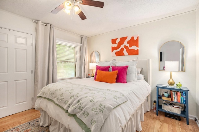 116 Whiting St, Galveston, TX 77550 - bedroom with wood finished floors and ceiling fan