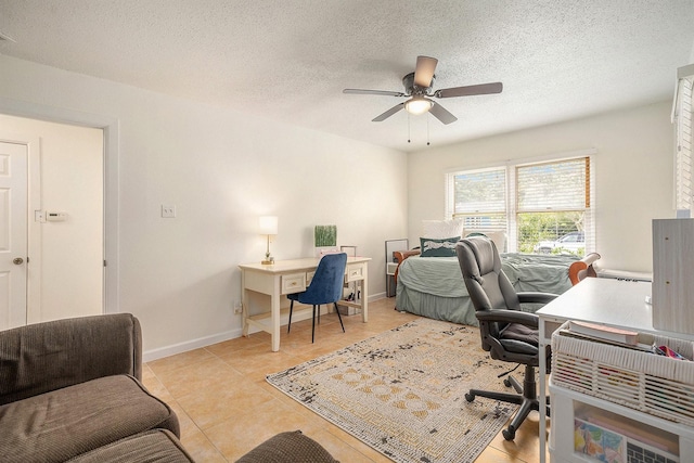 116 Whiting St, Galveston, TX 77550 - office featuring ceiling fan, light tile patterned flooring, baseboards, and a textured ceiling