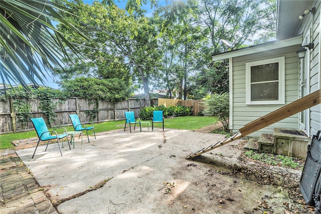 116 Whiting St, Galveston, TX 77550 - fenced backyard featuring a patio