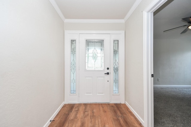 4618 Turf Valley Dr, Houston, TX 77084 - foyer featuring a ceiling fan, crown molding, baseboards, and wood finished floors