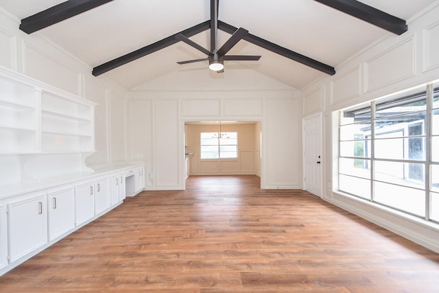 4618 Turf Valley Dr, Houston, TX 77084 - empty room featuring a decorative wall, ceiling fan, and light wood-type flooring