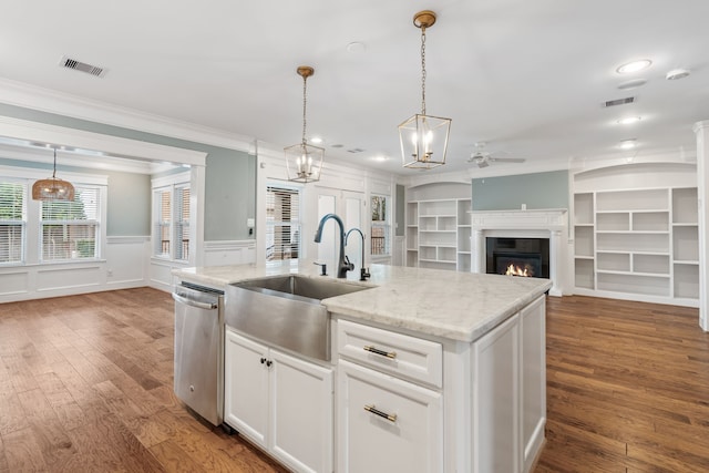 1510 Marshall St, Houston, TX 77006 - kitchen with a sink, dishwasher, ceiling fan, ornamental molding, and wood finished floors