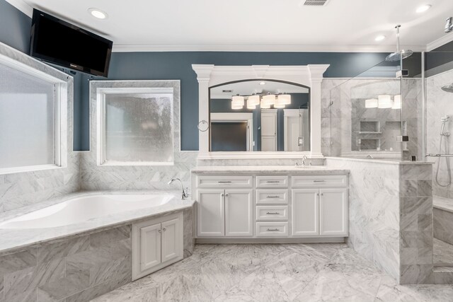 1510 Marshall St, Houston, TX 77006 - bathroom featuring a bath, double vanity, a marble finish shower, crown molding, and marble finish flooring