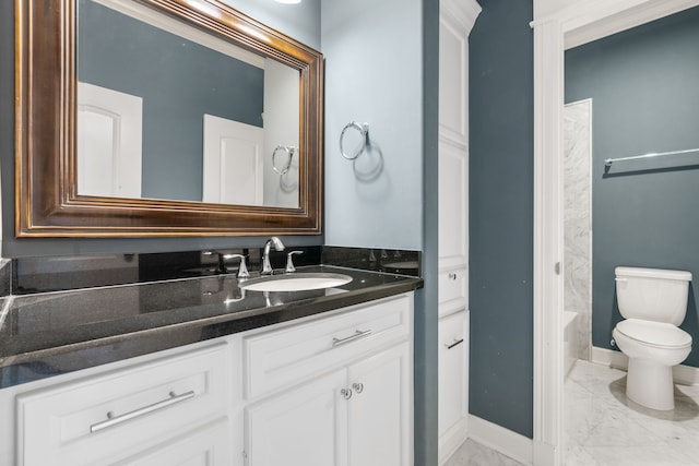 1510 Marshall St, Houston, TX 77006 - full bathroom featuring marble finish floors, vanity, toilet, and baseboards