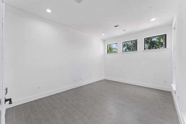 10070 Cedardale Dr, Houston, TX 77055 - empty room featuring recessed lighting and baseboards