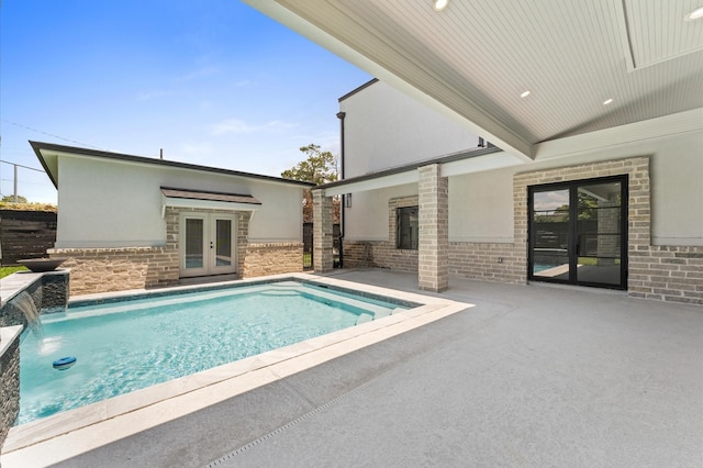 10070 Cedardale Dr, Houston, TX 77055 - swimming pool featuring french doors and a patio area