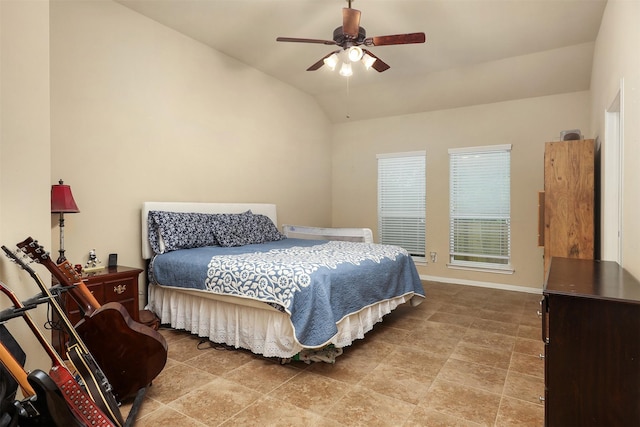 1027 Nantucket St, Pasadena, TX 77503 - bedroom with lofted ceiling, baseboards, ceiling fan, and stone finish floors
