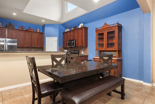 1027 Nantucket St, Pasadena, TX 77503 - dining area with light tile patterned floors, baseboards, and recessed lighting