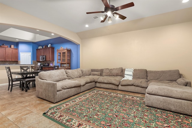 1027 Nantucket St, Pasadena, TX 77503 - living room featuring ceiling fan, recessed lighting, light tile patterned flooring, and arched walkways