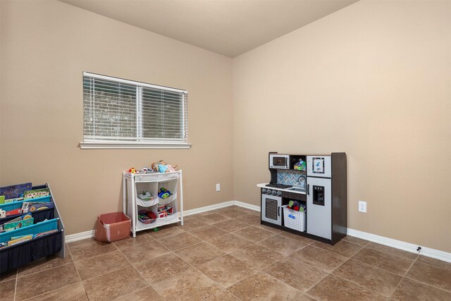 1027 Nantucket St, Pasadena, TX 77503 - playroom featuring baseboards