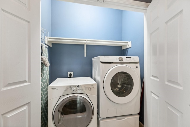 19119 Mossy Hedge Ln, Katy, TX 77449 - washroom featuring washing machine and clothes dryer