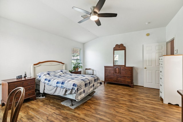 19119 Mossy Hedge Ln, Katy, TX 77449 - bedroom featuring wood finished floors, vaulted ceiling, and a ceiling fan