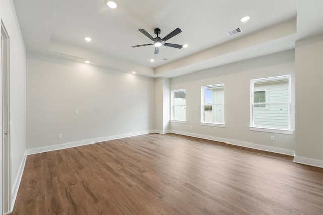 1932 Purswell Rd, Houston, TX 77055 - spare room with a raised ceiling, wood finished floors, ceiling fan, recessed lighting, and baseboards