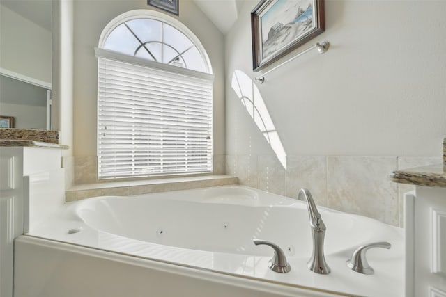 20688 Oakhurst Meadows Dr, Porter, TX 77365 - full bathroom with a jetted tub and vanity