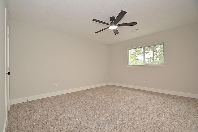 631 Aweigh Dr, Crosby, TX 77532 - empty room with a ceiling fan, baseboards, and carpet floors
