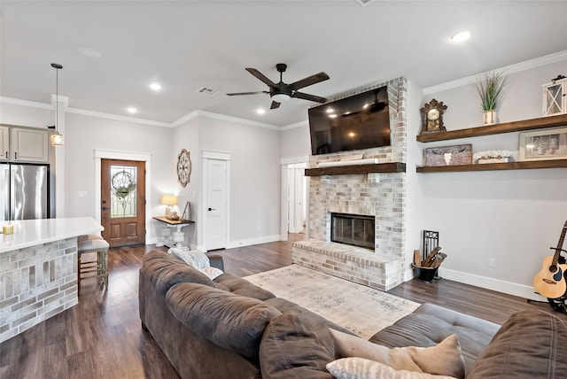 12078 County Road 175, Iola, TX 77861 - living room featuring recessed lighting, ceiling fan, a brick fireplace, baseboards, and dark wood-type flooring
