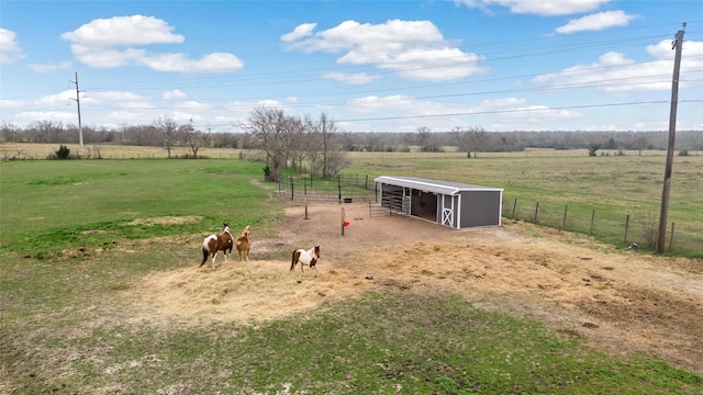 12078 County Road 175, Iola, TX 77861 - view of yard featuring a rural view, an exterior structure, and an outbuilding