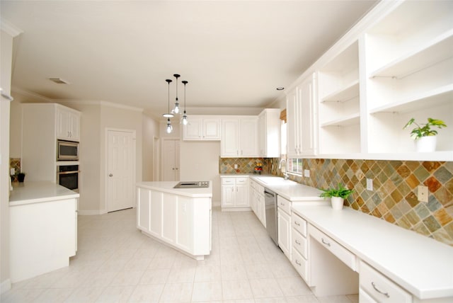 1902 Rosebay Ct, Sugar Land, TX 77479 - kitchen featuring appliances with stainless steel finishes, tasteful backsplash, a sink, a center island, and white cabinets