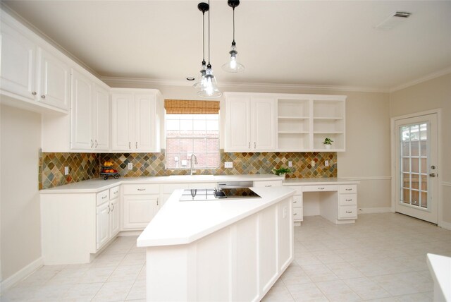 1902 Rosebay Ct, Sugar Land, TX 77479 - kitchen featuring electric cooktop, open shelves, a sink, decorative backsplash, and a center island