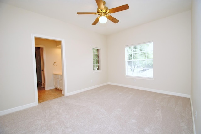 1902 Rosebay Ct, Sugar Land, TX 77479 - carpeted spare room with ceiling fan and baseboards