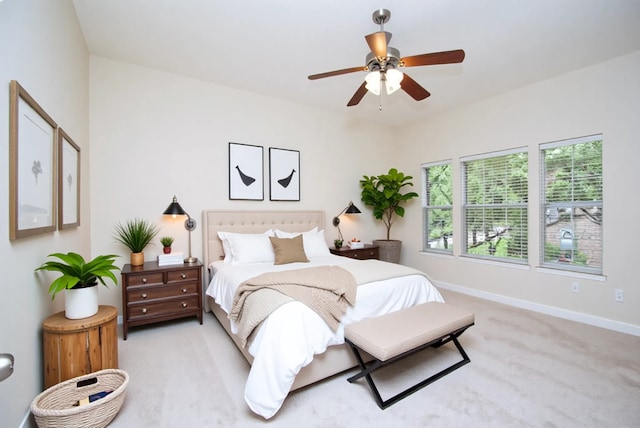 1902 Rosebay Ct, Sugar Land, TX 77479 - bedroom with light colored carpet, baseboards, and ceiling fan