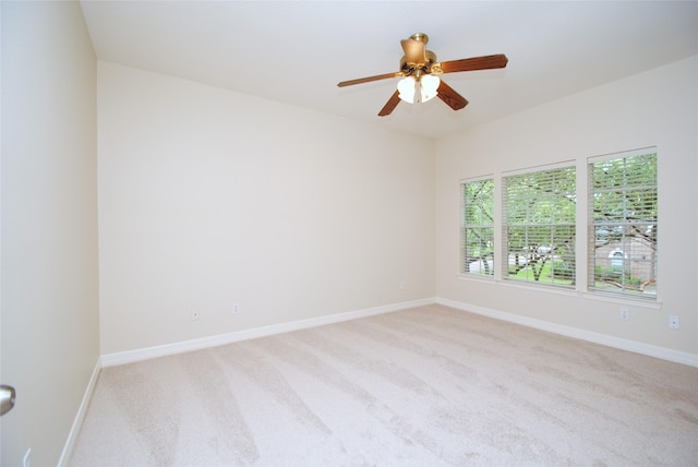 1902 Rosebay Ct, Sugar Land, TX 77479 - unfurnished room with light carpet, ceiling fan, and baseboards