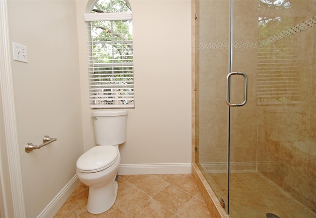 1902 Rosebay Ct, Sugar Land, TX 77479 - full bathroom featuring toilet, a shower stall, baseboards, and tile patterned flooring
