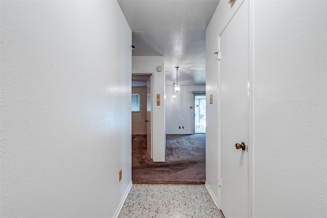 119 Delaware Dr, Conroe, TX 77316 - hallway featuring baseboards