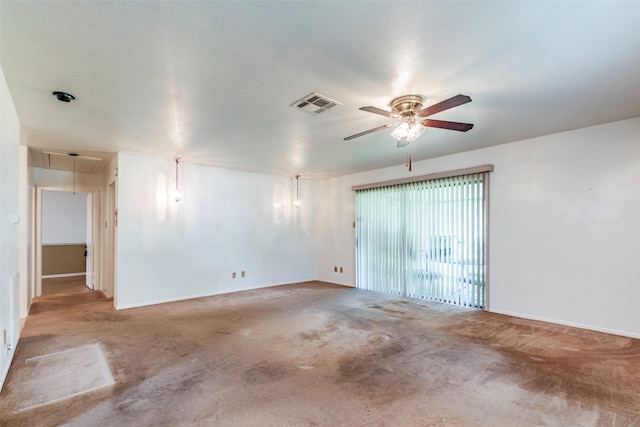 119 Delaware Dr, Conroe, TX 77316 - carpeted empty room featuring attic access, ceiling fan, and baseboards