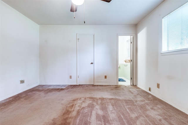119 Delaware Dr, Conroe, TX 77316 - unfurnished bedroom with carpet, baseboards, and ensuite bathroom