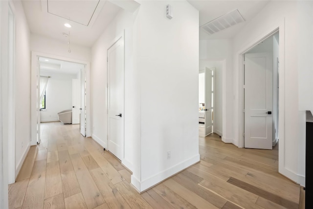 1913 Ebony Ln, Houston, TX 77018 - hallway featuring attic access, light wood-style floors, baseboards, and recessed lighting