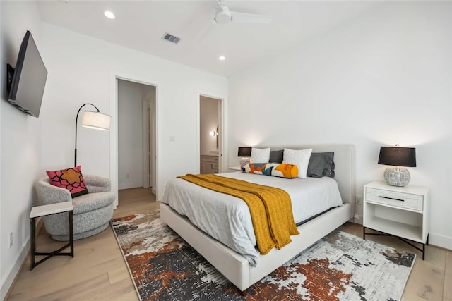 1913 Ebony Ln, Houston, TX 77018 - bedroom featuring recessed lighting, light wood-style floors, baseboards, connected bathroom, and a ceiling fan