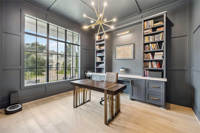 1913 Ebony Ln, Houston, TX 77018 - office space with coffered ceiling, light wood-style flooring, a chandelier, built in features, and a decorative wall