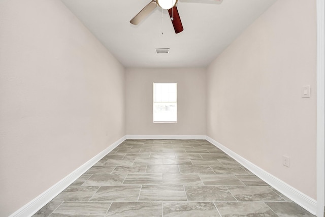 4918 Perry St, Houston, TX 77021 - unfurnished room featuring a ceiling fan and baseboards